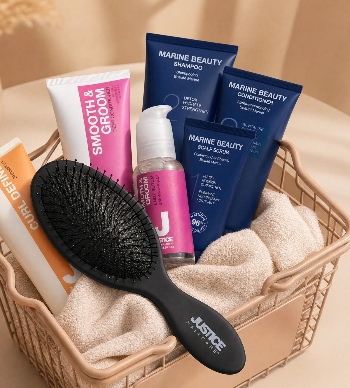 Justice haircare products and a brush in a wire basket